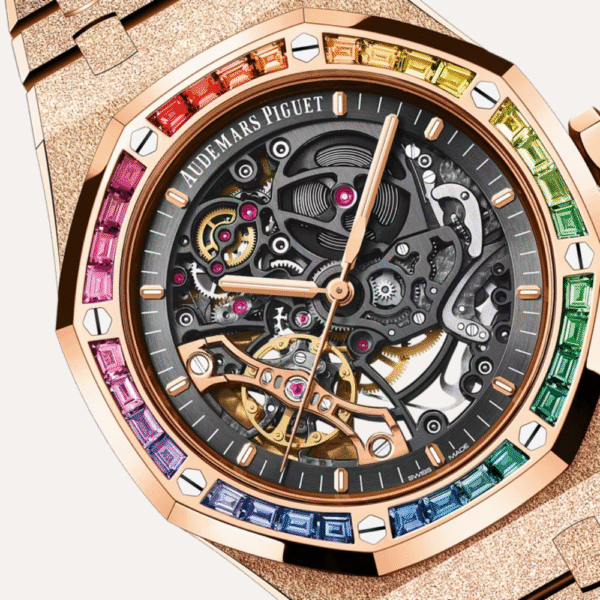Audemars Piguet Royal Oak Frosted Gold Double Balance Wheel Openworked 41mm, Pink Gold Case & Bracelet, Baguette-Cut Multicoloured Gemstone Bezel, Slate Grey Openworked Movement.